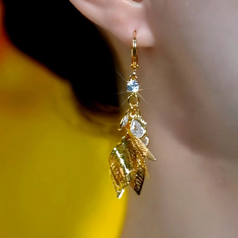 Close-up detail of the sparkling zircons and plating on the Jade Leaf Earrings