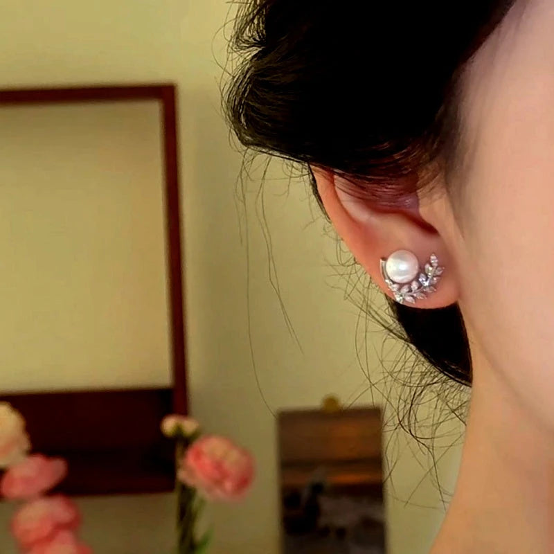 Close-up detail of the sparkling zircons and plating on the Pearl Stud Earrings