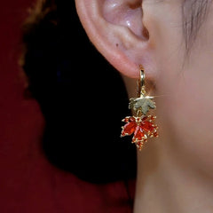 Close-up detail of the sparkling zircons and plating on the Leaf Tassel Earrings