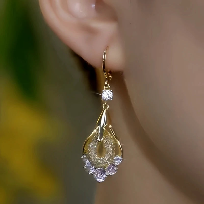 Close-up detail of the sparkling zircons and plating on the Water Drop Earrings