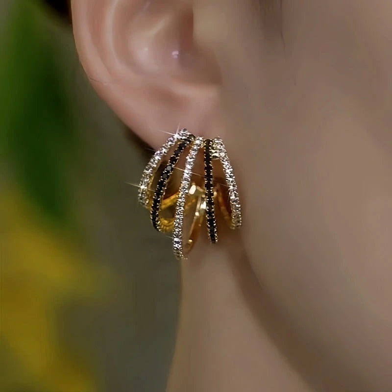 Close-up detail of the sparkling zircons and plating on the Multi-Layer Hoop Earrings