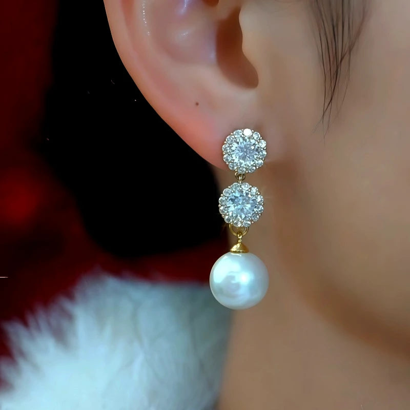 Close-up detail of the sparkling zircons and plating on the Pearl Drop Earrings