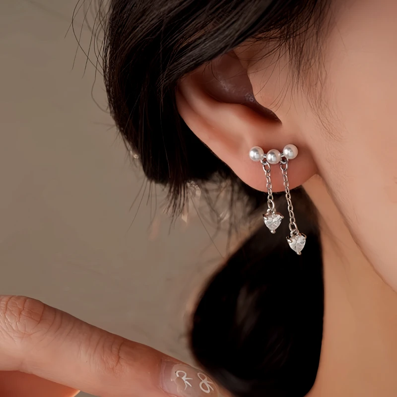 Close-up detail of the sparkling zircons and plating on the Pearl Tassel Earrings