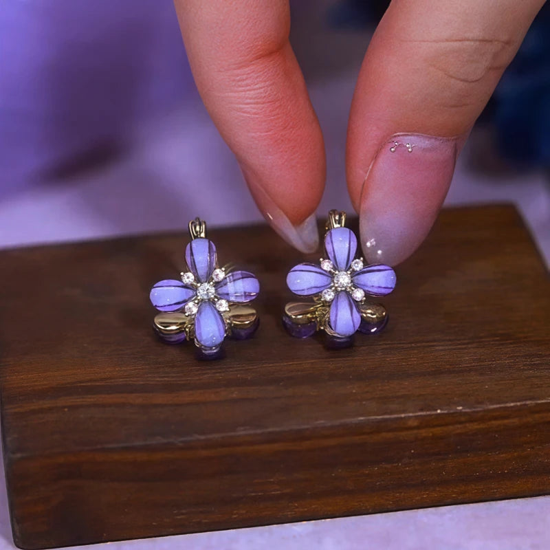 Close-up detail of the sparkling zircons and plating on the Purple Flower Earrings