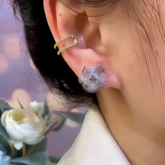 Close-up detail of the sparkling zircons and plating on the Windmill Earrings