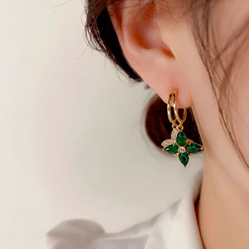 Close-up detail of the sparkling zircons and plating on the Star Earrings