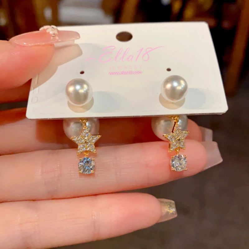 Angled view of the 14K Gold-Plated Elegant Zircon Diamond Star Pearl Jacket Earrings
