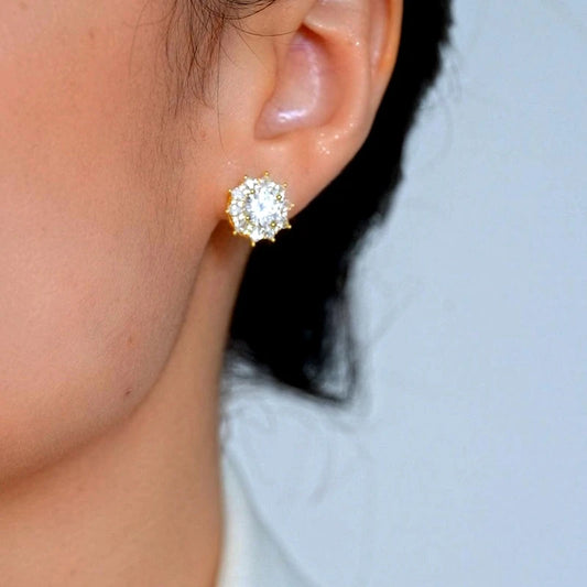 Model showcasing the dangle and style of the 14K Gold-Plated Elegant Zircon Diamond Stud Earrings