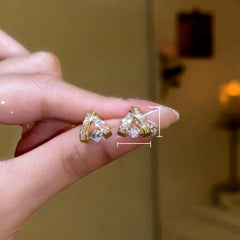 Close-up detail of the sparkling zircons and plating on the Zircon Stud Earrings