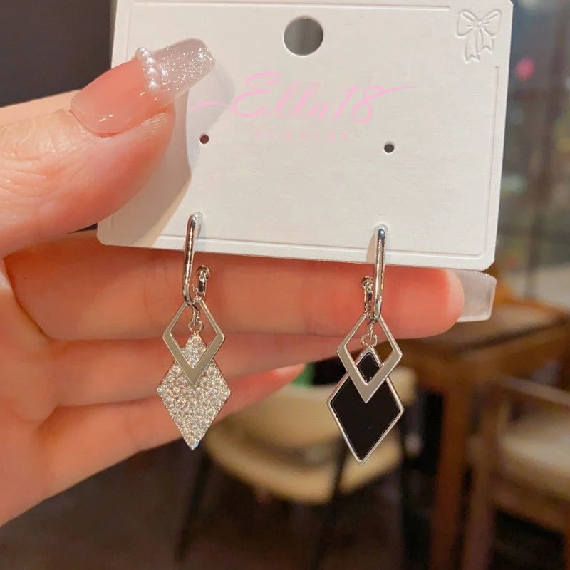 Angled view of the 14K Gold-Plated Elegant Zircon Diamond Tassel Earrings