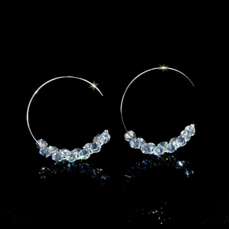 Close-up detail of the sparkling zircons and plating on the Zircon Threader Earrings