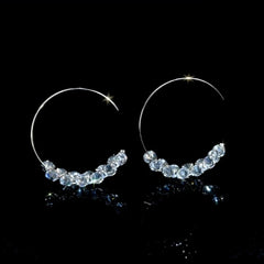 Close-up detail of the sparkling zircons and plating on the Zircon Threader Earrings