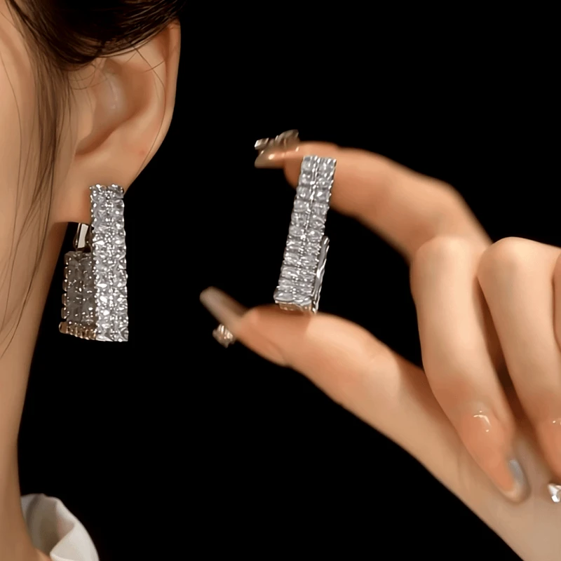 Close-up detail of the sparkling zircons and plating on the Trapezoidal Earrings