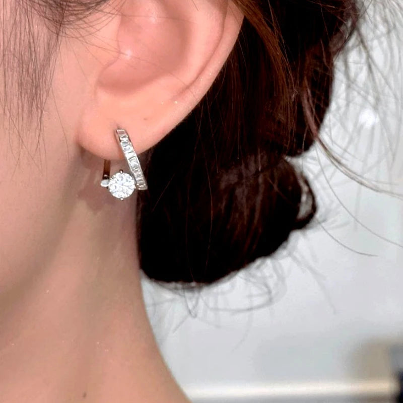 Close-up detail of the sparkling zircons and plating on the Twisted Earrings