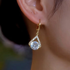 Close-up detail of the sparkling zircons and plating on the Gold Water Drop Earrings