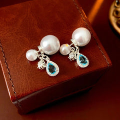 Angled view of the 14K Gold-Plated Elegant Zircon Diamond Water Drop Pearl Jacket Earrings