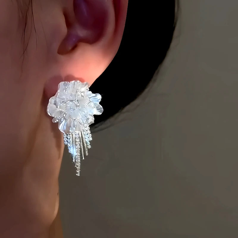 Close-up detail of the sparkling zircons and plating on the White Camellia Earrings