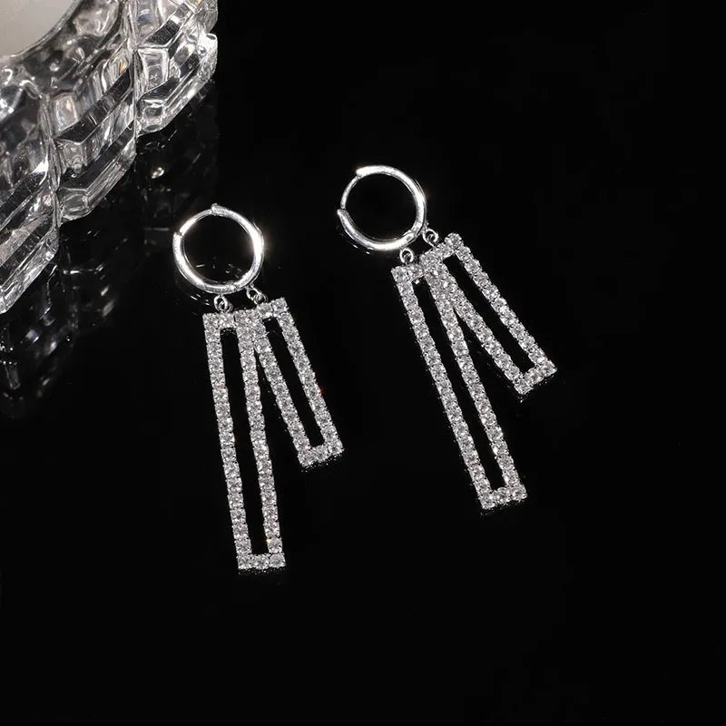 Angled view of the 14K Gold-Plated Elegant Zircon Diamoond Tassel Earrings