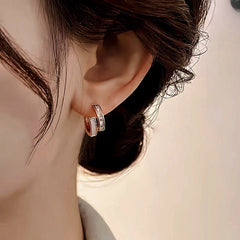 Angled view of the 14K Gold-Plated Elegant Zircon Double-Layer Earrings