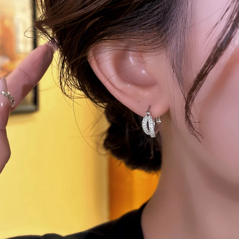 Close-up detail of the sparkling zircons and plating on the Double-Layer Hoops