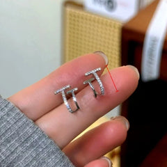 Angled view of the 14K Gold-Plated Elegant Zircon Double-Layer T Stud Earrings