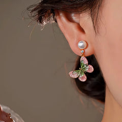 Close-up detail of the sparkling zircons and plating on the Butterfly Tassel Earrings