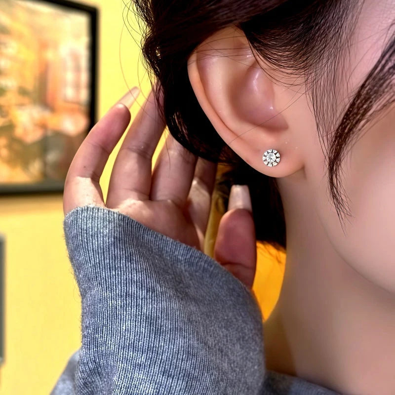 Close-up detail of the sparkling zircons and plating on the Fan Shaped Jacket Earrings