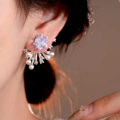 Model showcasing the dangle and style of the 14K Gold-Plated Elegant Zircon Firework Pearl Earrings