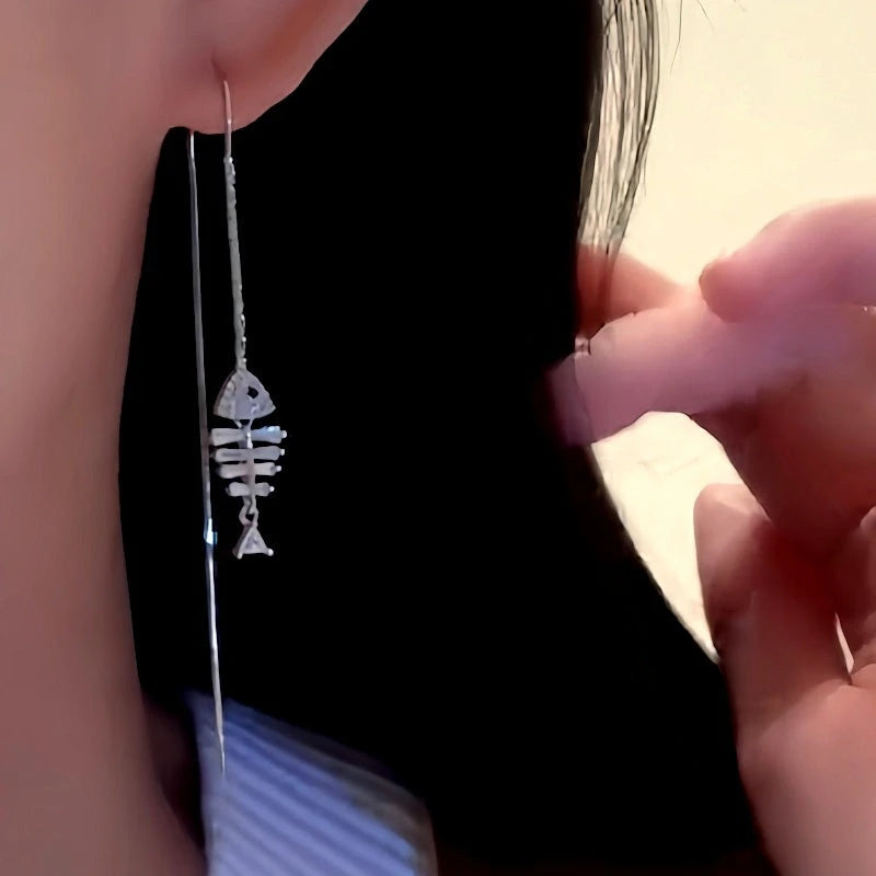 Close-up detail of the sparkling zircons and plating on the Fishbone Tassel Threaders