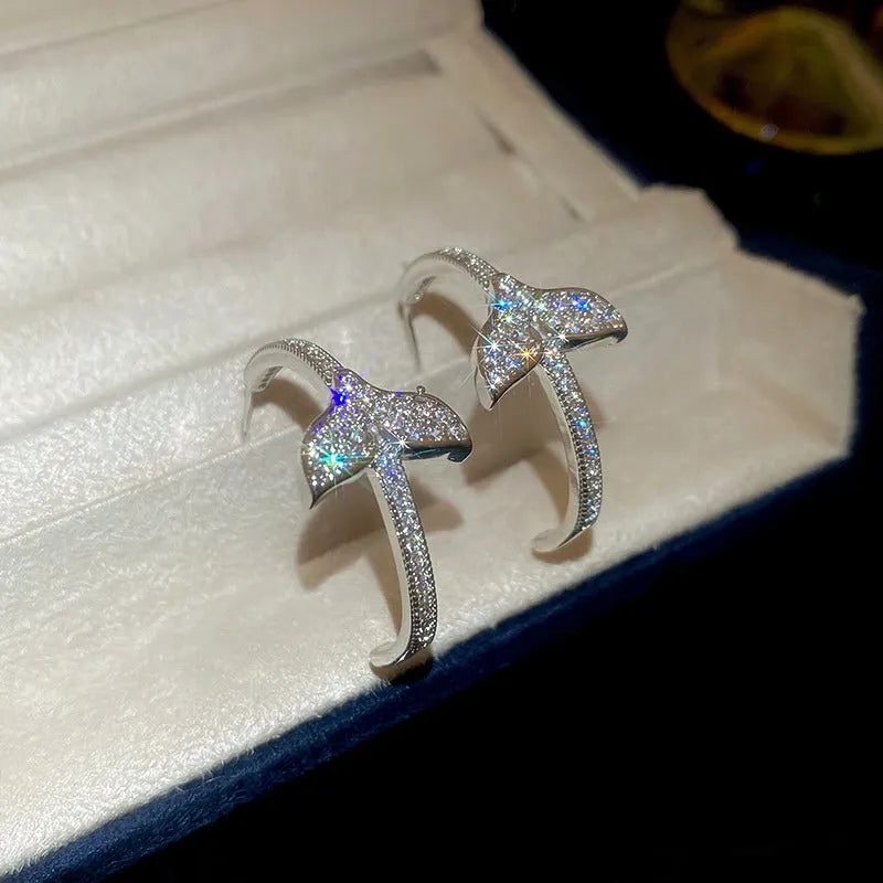 Angled view of the 14K Gold-Plated Elegant Zircon Fishtail C-Shaped Earrings