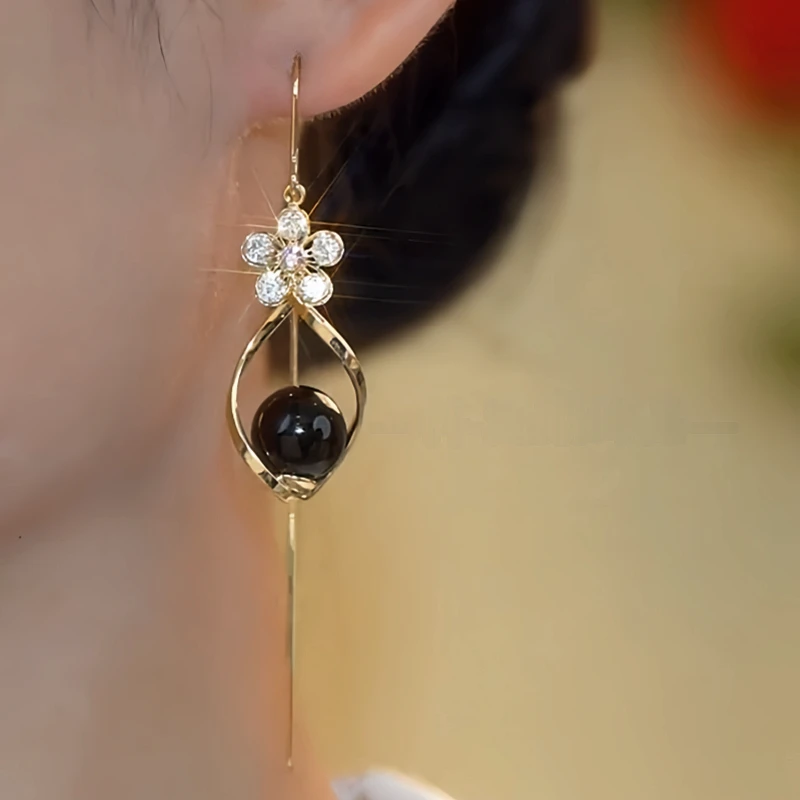 Close-up detail of the sparkling zircons and plating on the Black Bead Threaders