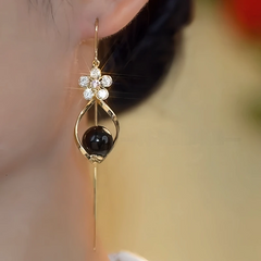 Close-up detail of the sparkling zircons and plating on the Black Bead Threaders