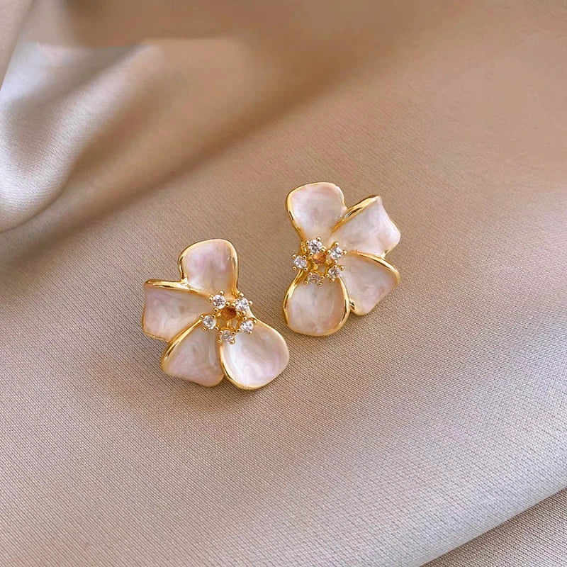 Angled view of the 14K Gold-Plated Elegant Zircon Flower Earrings