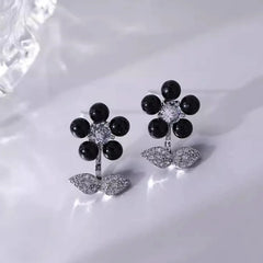 Angled view of the 14K Gold-Plated Elegant Zircon Flower Earrings