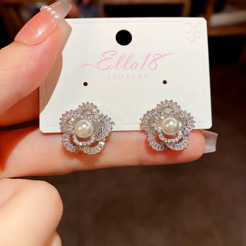 Angled view of the 14K Gold-Plated Elegant Zircon Flower Pearl Stud Earrings