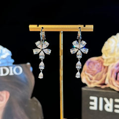 Angled view of the 14K Gold-Plated Elegant Zircon Flower Tassel Earrings