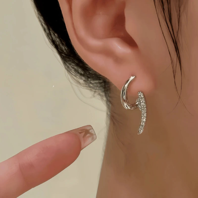 Model showcasing the dangle and style of the 14K Gold-Plated Elegant Zircon Geometric Earrings