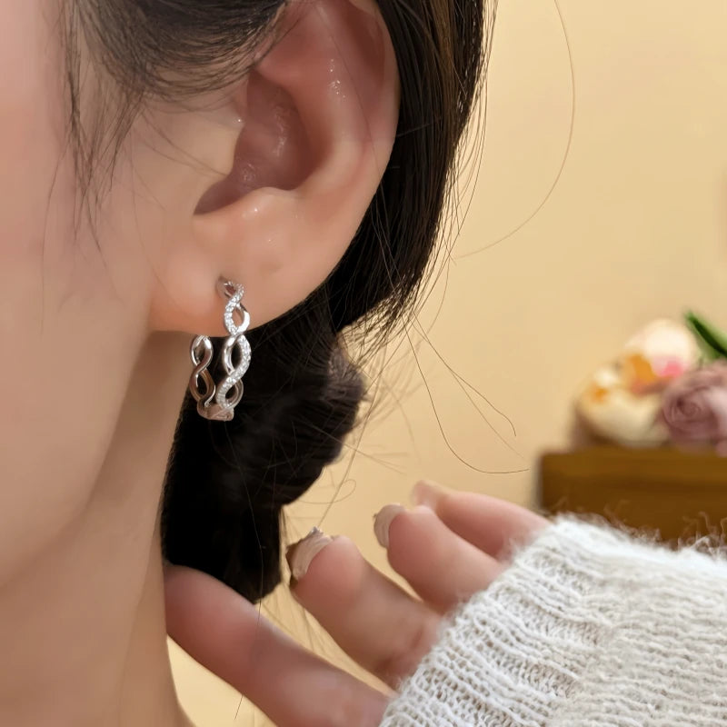 Angled view of the 14K Gold-Plated Elegant Zircon Geometric Hoop Earrings