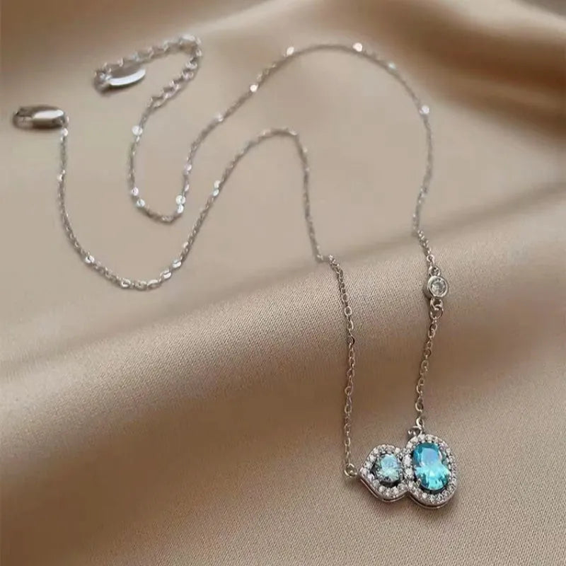 14K Gold-Plated Elegant Zircon Gourd Clavicle Necklace worn to showcase its length and pendant detail