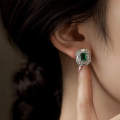 Angled view of the 14K Gold-Plated Elegant Zircon Green Diamond Stud Earrings