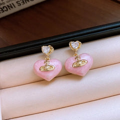 Angled view of the 14K Gold-Plated Elegant Zircon Heart Earrings