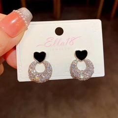 Angled view of the 14K Gold-Plated Elegant Zircon Heart Earrings