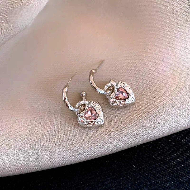 Angled view of the 14K Gold-Plated Elegant Zircon Heart Pendant Earrings