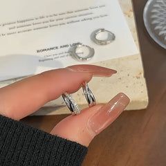 Angled view of the 14K Gold-Plated Elegant Zircon Hoop Earrings