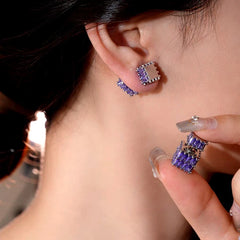 Model showcasing the dangle and style of the 14K Gold-Plated Elegant Zircon Jacket Earrings
