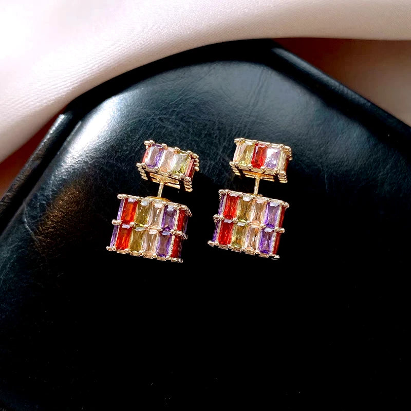 Angled view of the 14K Gold-Plated Elegant Zircon Jacket Earrings