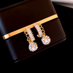 Angled view of the 14K Gold-Plated Elegant Zircon Lace Ball Earrings