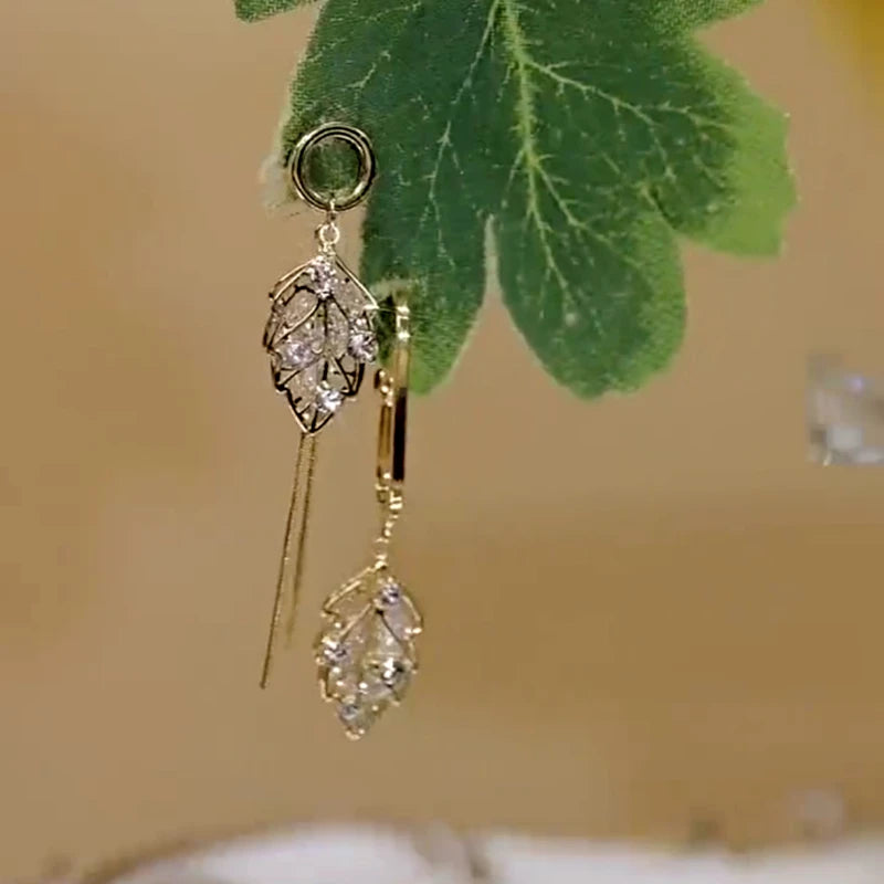 Angled view of the 14K Gold-Plated Elegant Zircon Leaf Earrings
