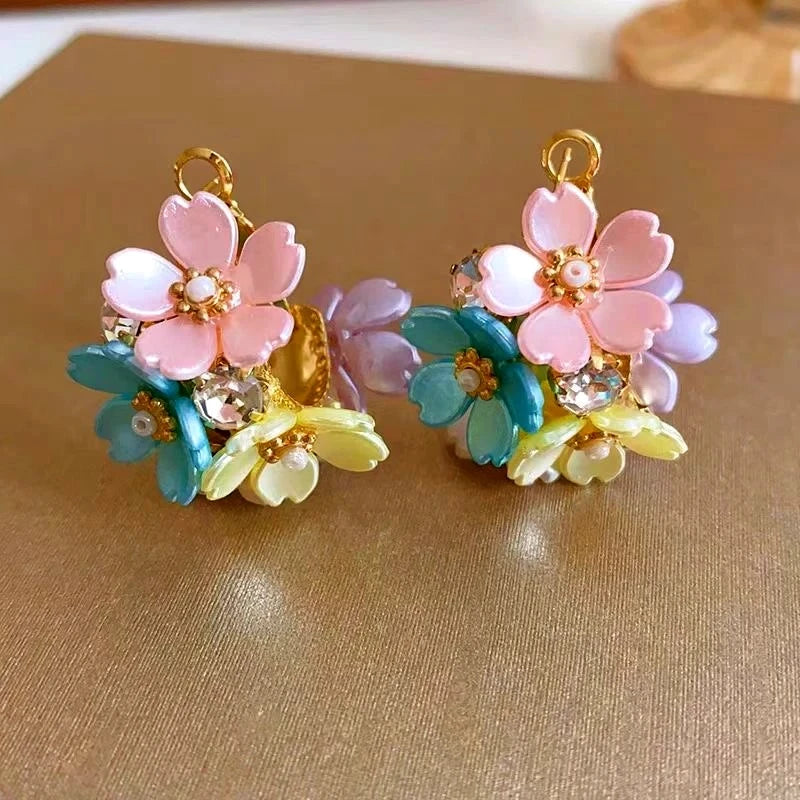 Angled view of the 14K Gold-Plated Elegant Zircon Leaf Earrings