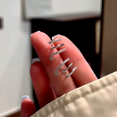 Angled view of the 14K Gold-Plated Elegant Zircon Multi-Layer Star Stud Earrings